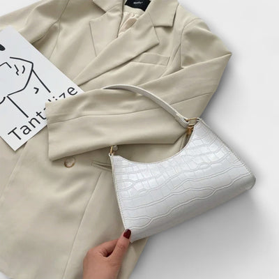 Flair. Glänzende Ledertasche